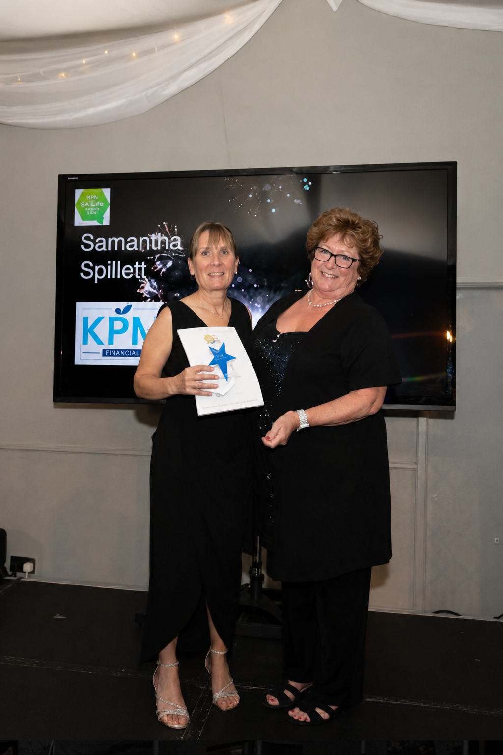 Samantha Spillett receiving the Business Woman of the Year award